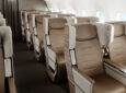 ZIM The Frame aircraft seat in brown tones