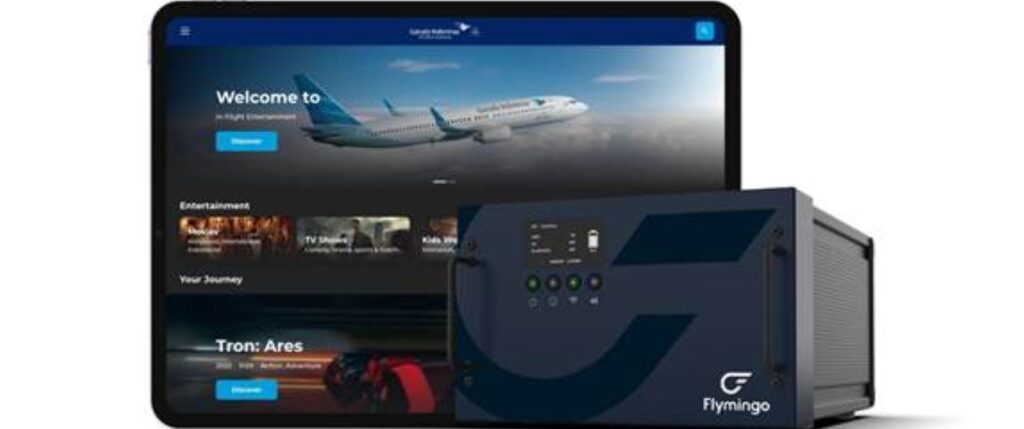 Garuda Indonesia IFE content is seen on a tablet. The Moment Flamingo Box is in front.