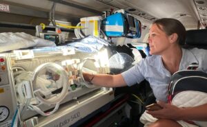 Incubators and associated equipment weigh as much as 200lb. This anxious mom was able to keep physical contact with her baby during the flight. Image: Lia’s Wings