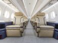 ATR HighLine all-business cabin for Berjaya Air. Seats are cream with blue piping and beige headrests.