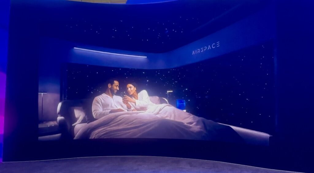 A couple sleeping in the double bed on board