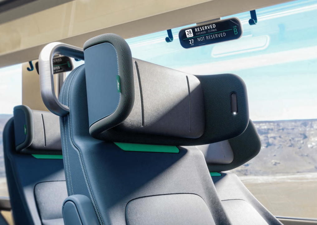 Amtrak standard coach class seating with winged headrest.