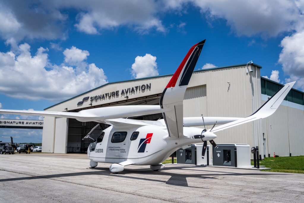 ALIA CTOL aircraft by BETA is parked in front of the Signature Aviation hangar
