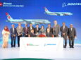 Boeing and Biman Bangladesh Airlines execs celebrate the deal