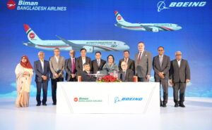 Boeing and Biman Bangladesh Airlines execs celebrate the deal