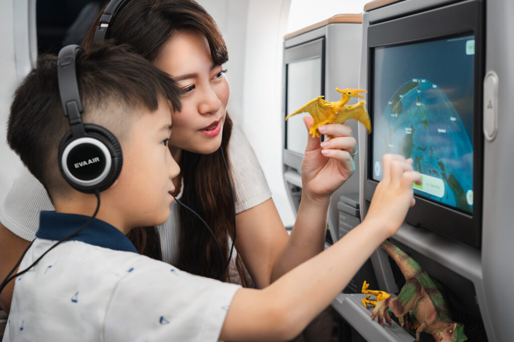 Two passengers are using Panasonic's Arc map on an EVA Air flight.
