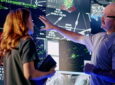 Controllers interact with advanced airspace surveillance and automation displays at a Collins Aerospace facility, supported by radar systems like those that will be produced at the company’s expanded Largo, Florida site, helping enhance situational awareness and decision-making in complex airspace environments.