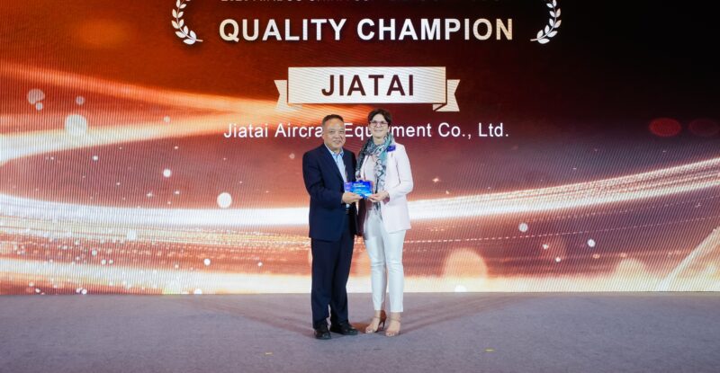Jiatai accepting an award at the Airbus China Suppliers Symposium.