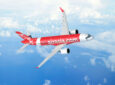 AirAsia Airbus A220-300 in flight. The airline today purchased 150 of the type but vowed to buy a stretched version should Airbus build the A220-500