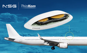 A twinjet is fitted with the ThinKom ThinAir Ka2517 antenna, NSG and ThinKom signage is above it