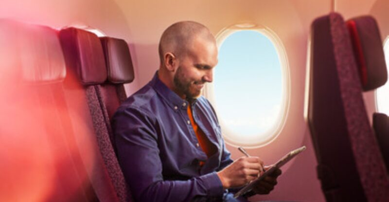 A Virgin Atlantic passenger is connecting to Sport 24 using their mobile device and Starlink connection.