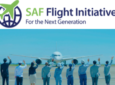 Various members of the ANA staff waving at an aircraft. The text above them reads "SAF Flight Initiative."