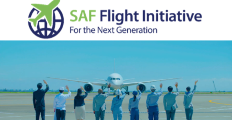 Various members of the ANA staff waving at an aircraft. The text above them reads "SAF Flight Initiative."
