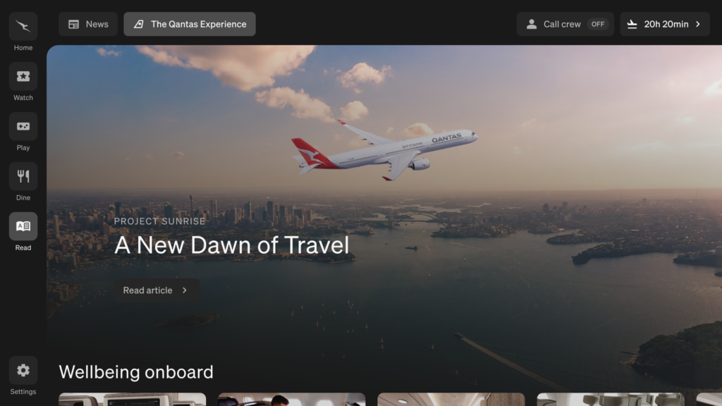 IFE screen says "a new dawn of travel" with a Qantas A350-1000ULR flying overhead.