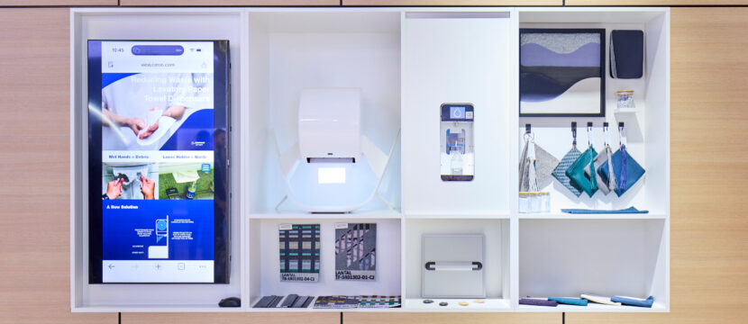 Boeing's sustainability wall at AIX 2026, featuring a variety of different products that are either part of its catalog or in the process of becoming linefit offerable.