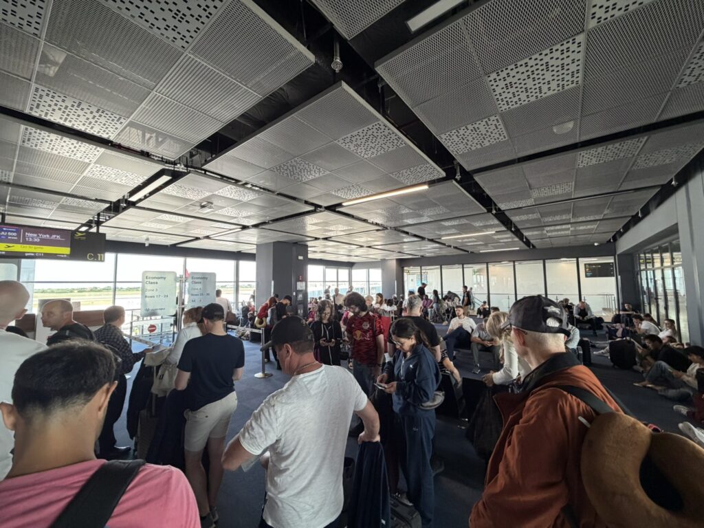 The scrum at Belgrade airport as passengers were waiting to board.