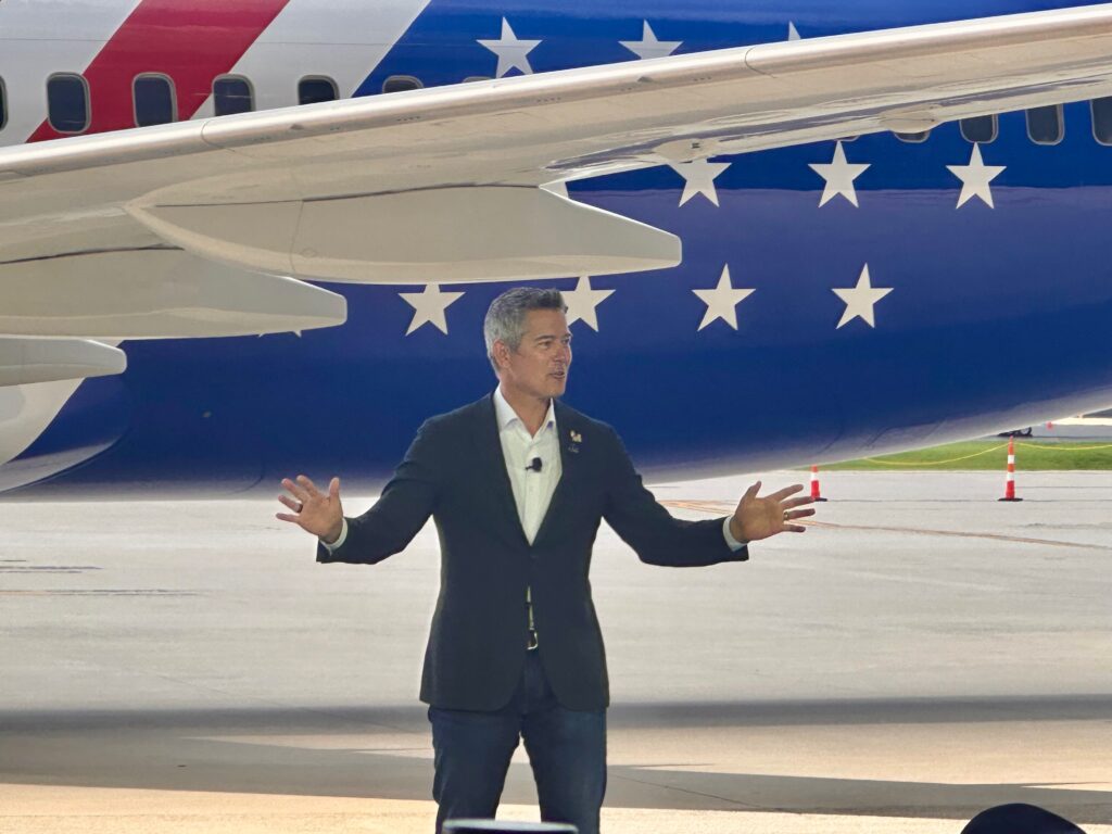 Transportation Secretary Sean Duffy in front of the jet