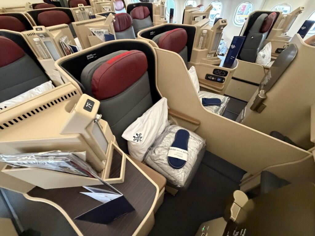 Looking down into the Air Serbia center pair seats in business class, with the divider up