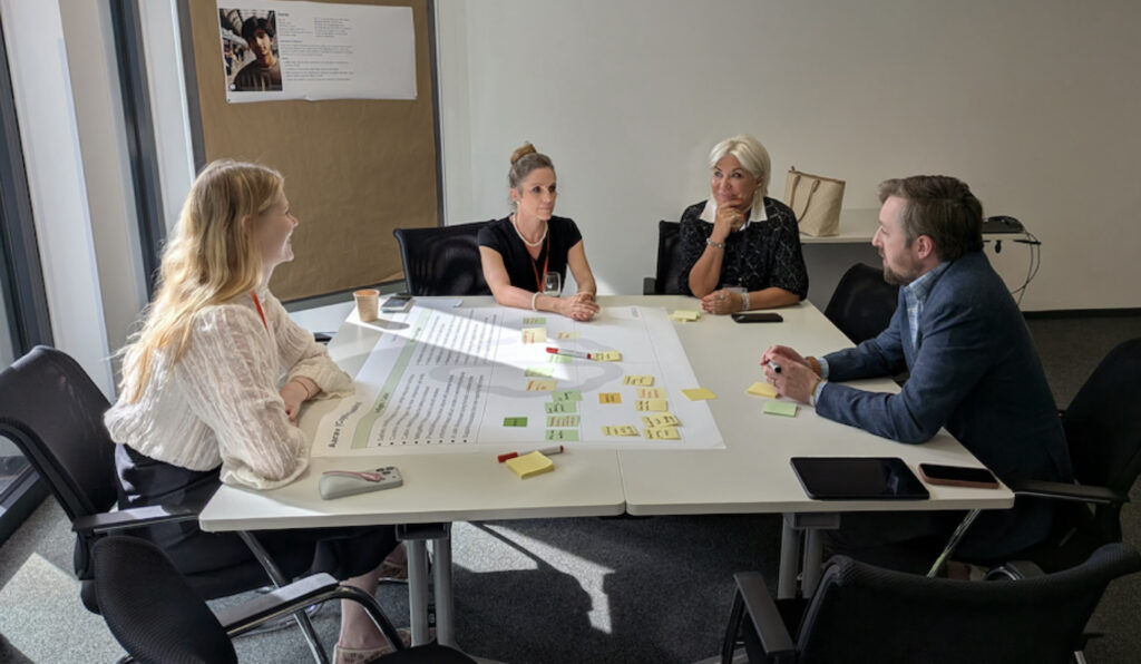 A working group at the RedCabin event, 