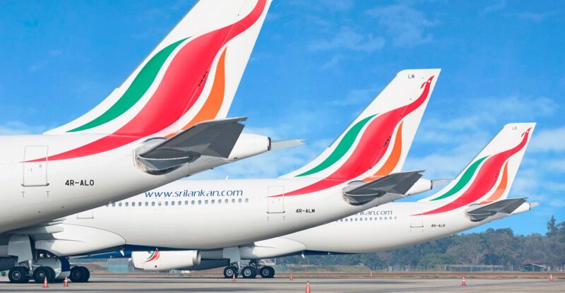 SriLankan Airlines aircraft tails parked in a row.
