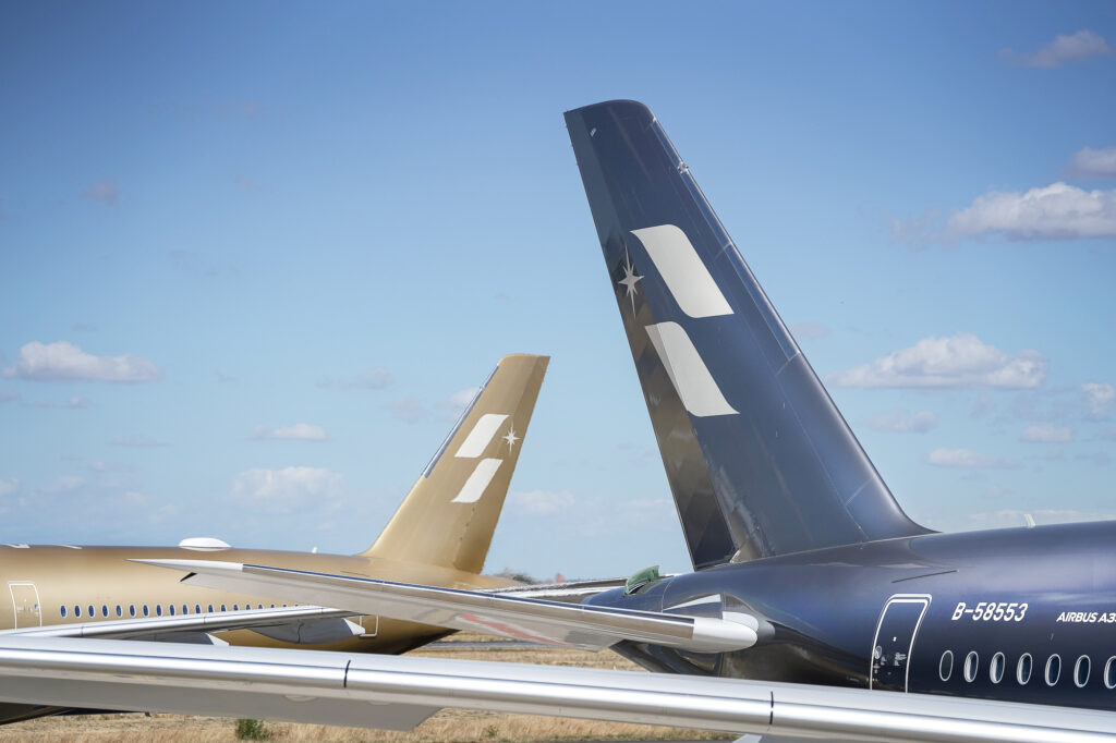 STARLUX AIRSORAYAMA silver and gold tails together.