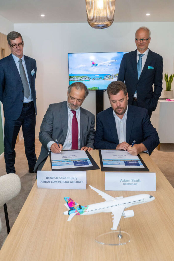 BermudAir CEO Adam Scott and Airbus' Benoît de Saint-Exupéry, Airbus EVP Sales of the Commercial Aircraft Business, signing the aircraft order