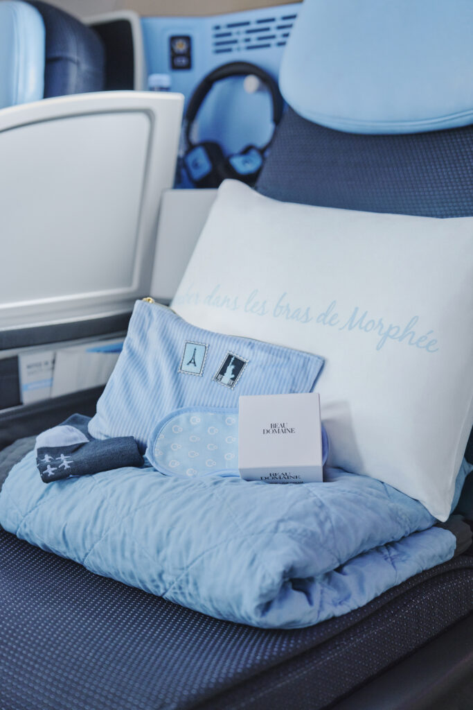 La Compagnie amenity kit displayed on the business class seat.