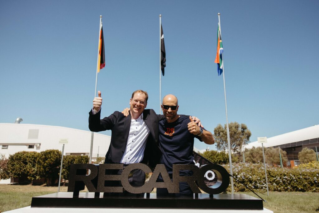 Rene Dankworth and Christian Wasler in front of the RECARO Composites facility.