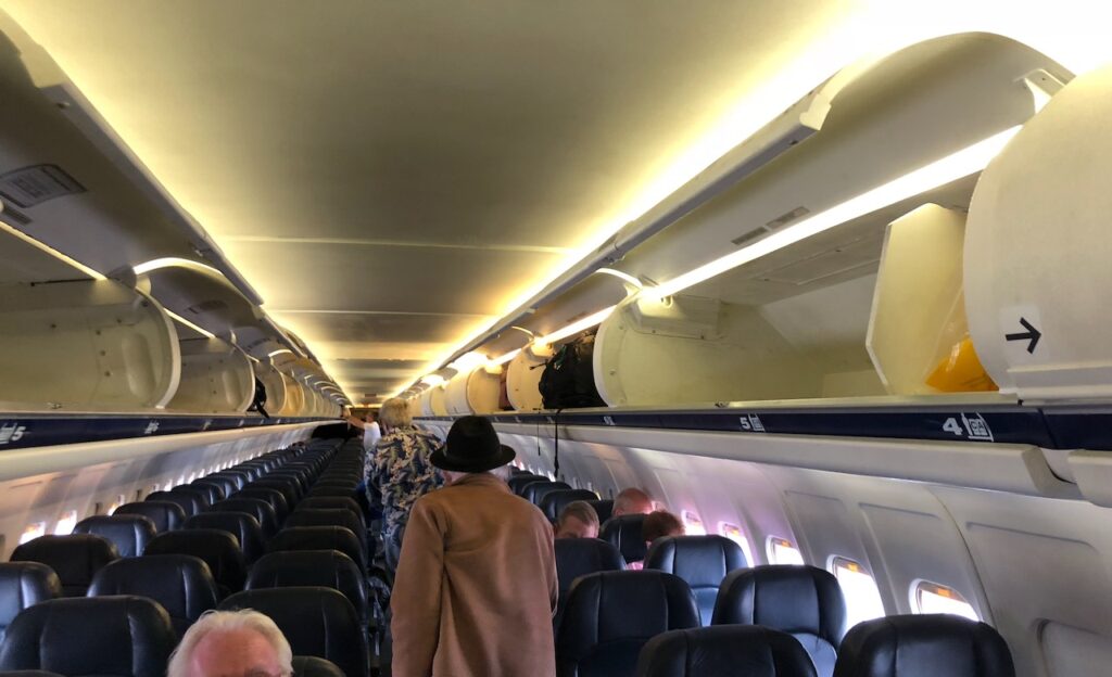 The interior cabin of the Allegiant McDonnell Douglas MD-80 from 2018.
