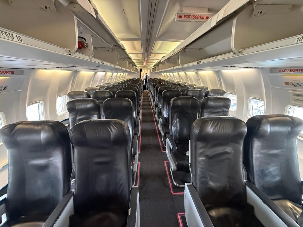 Looking down the cabin of the Boeing 737-300 aircraft.