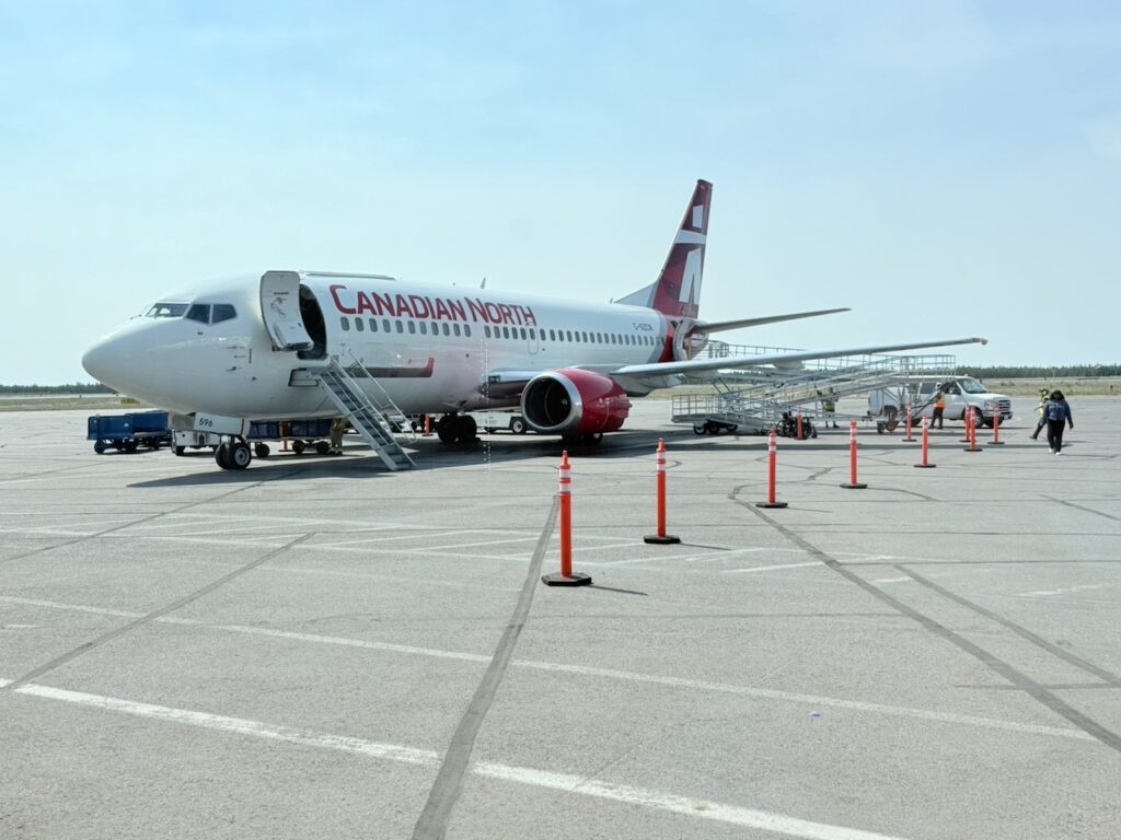 Canadian North Boeing 737-300 on ramp for boarding at YZF.