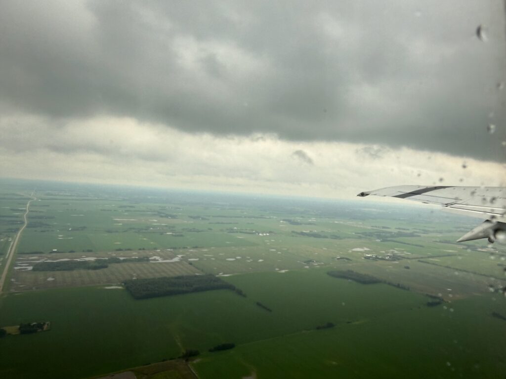 The aircraft's departure into the clouds.