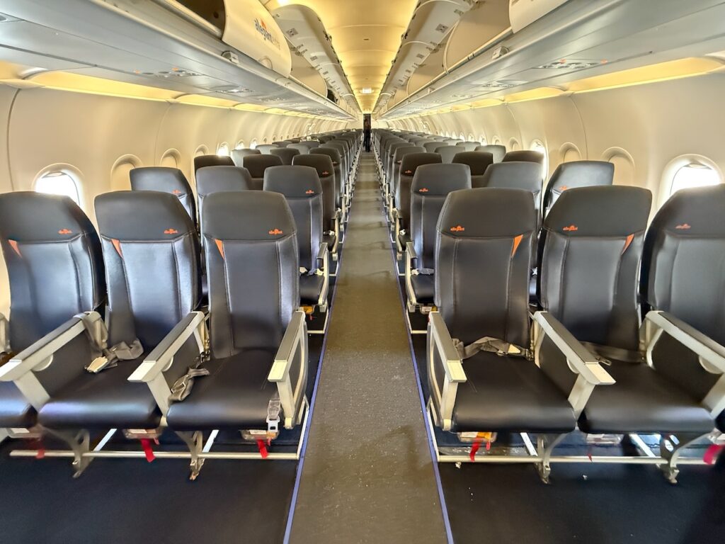 Inside Allegiant's cabin. The layout is a 3-3 configuration.