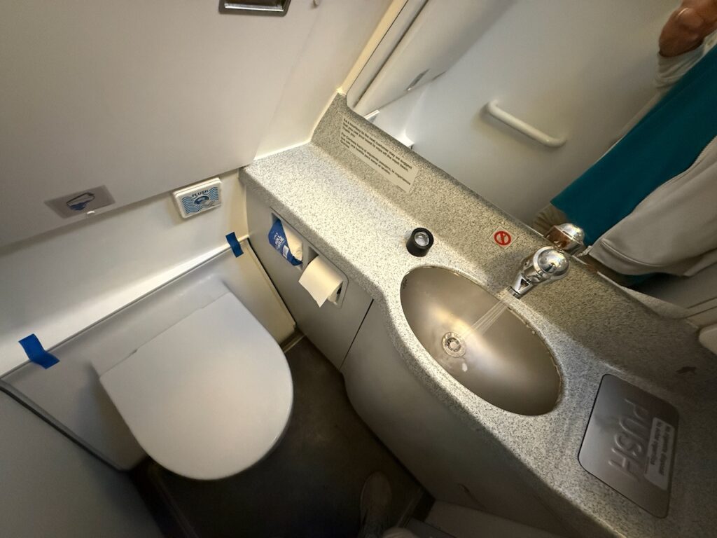 Aircraft lavatory on an Allegiant flight.