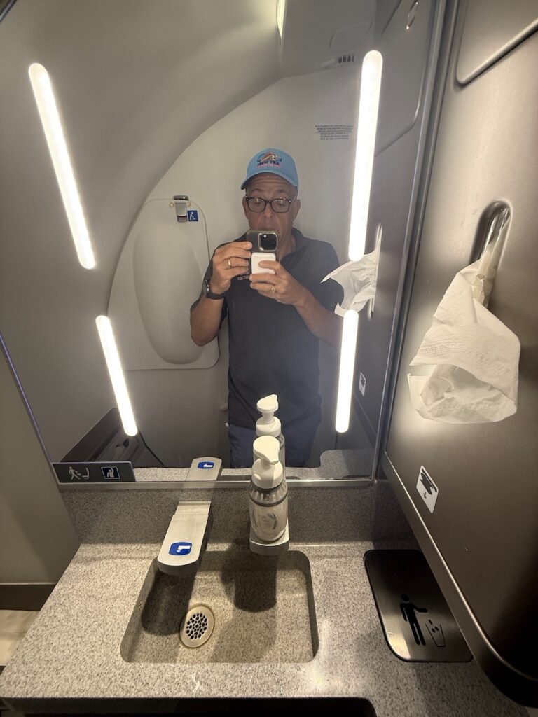 Author Chris Sloan taking a selfie in the Lavatory mirror.