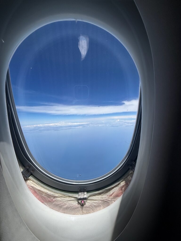 A close up of the aircraft window.
