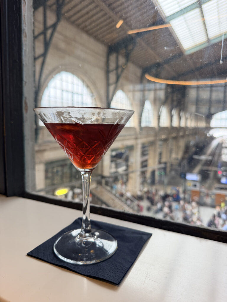 A Manhattan, which is served in heavy, cut glassware, at the Eurostar Premier Lounge