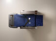 Overhead view of RECARO R4 Premium class seat in blue with grey headrests.