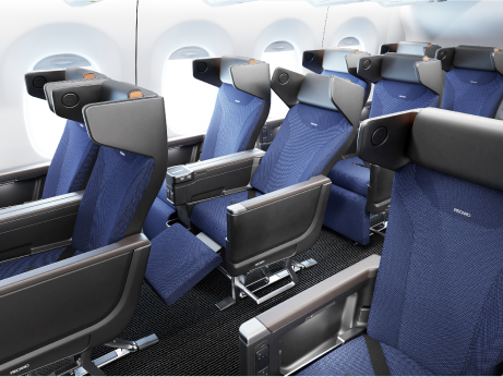 RECARO R4 Premium class seat in blue with grey headrests, with privacy wings.