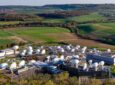 SES satellite dishes at its facility in Betzdorf .
