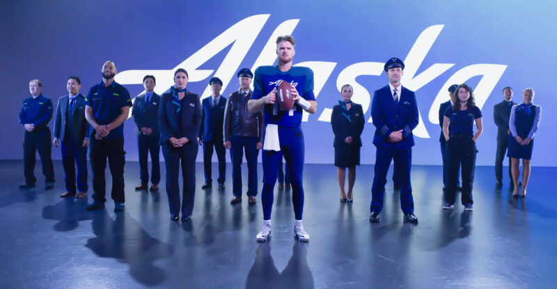 Sam Darnold with Alaska Airlines crew members
