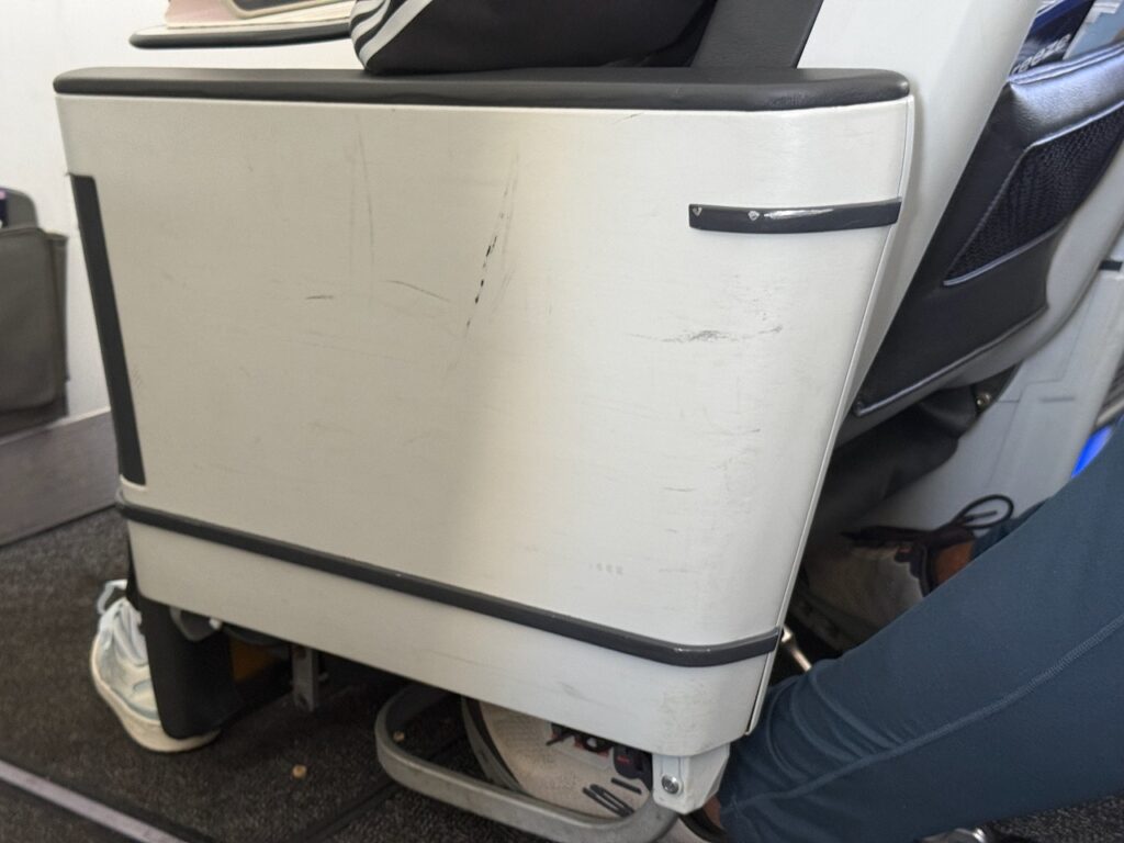 Wear and tear is evident on the seat.