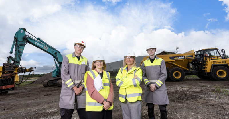 Airbus execs pose for a photo at the ground breaking in Belfast.
