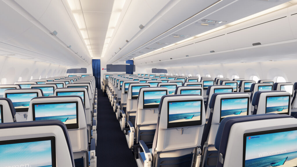 Edelweiss economy class on the Airbus A350 with rows of seats and seatback IFE screens