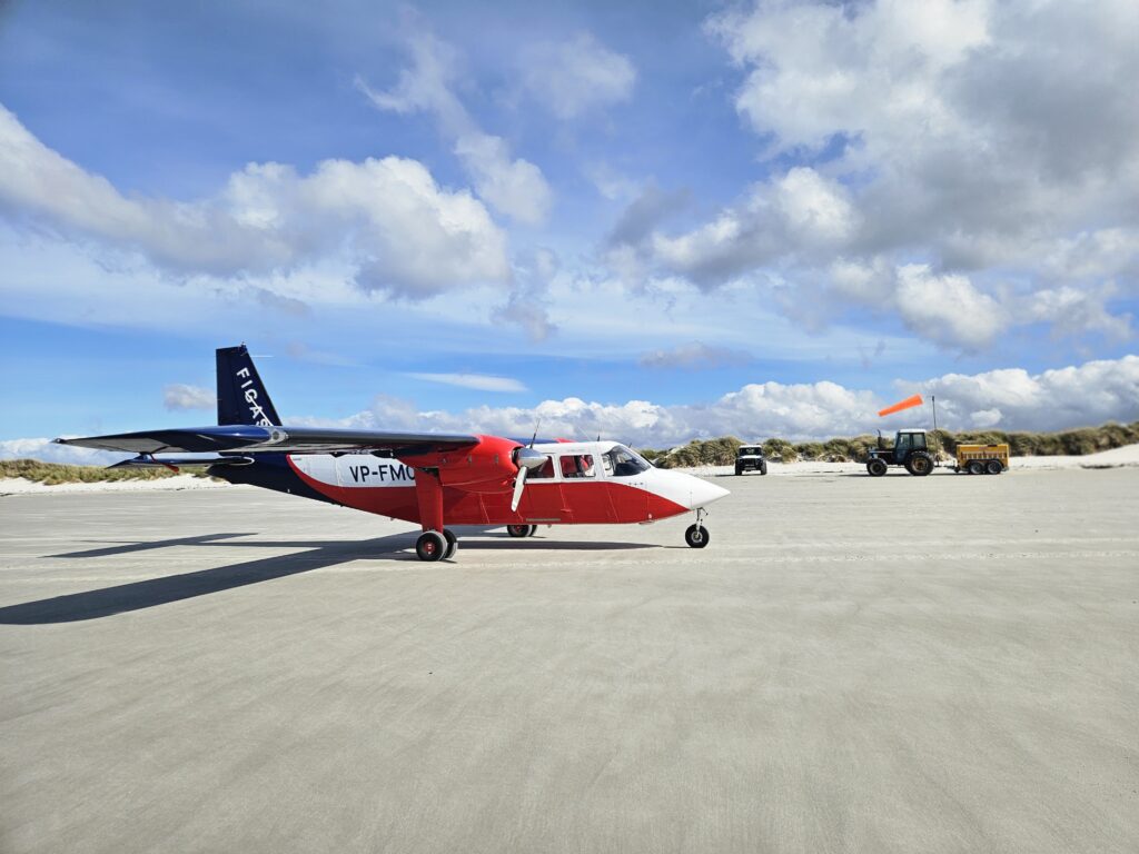 FIGAS Islander on Keppel Island beach, Falkland Islands.
