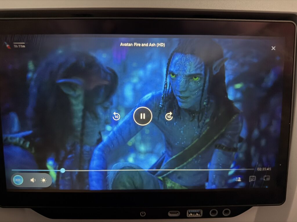 Thales’ AVANT entertainment system with 4K HDR screen showing the latest Avatar movie.