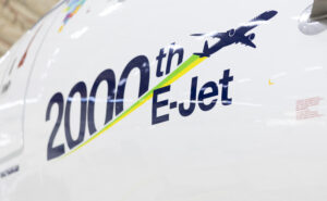 Side of an Azul Embraer E195-E2 in the hangar
