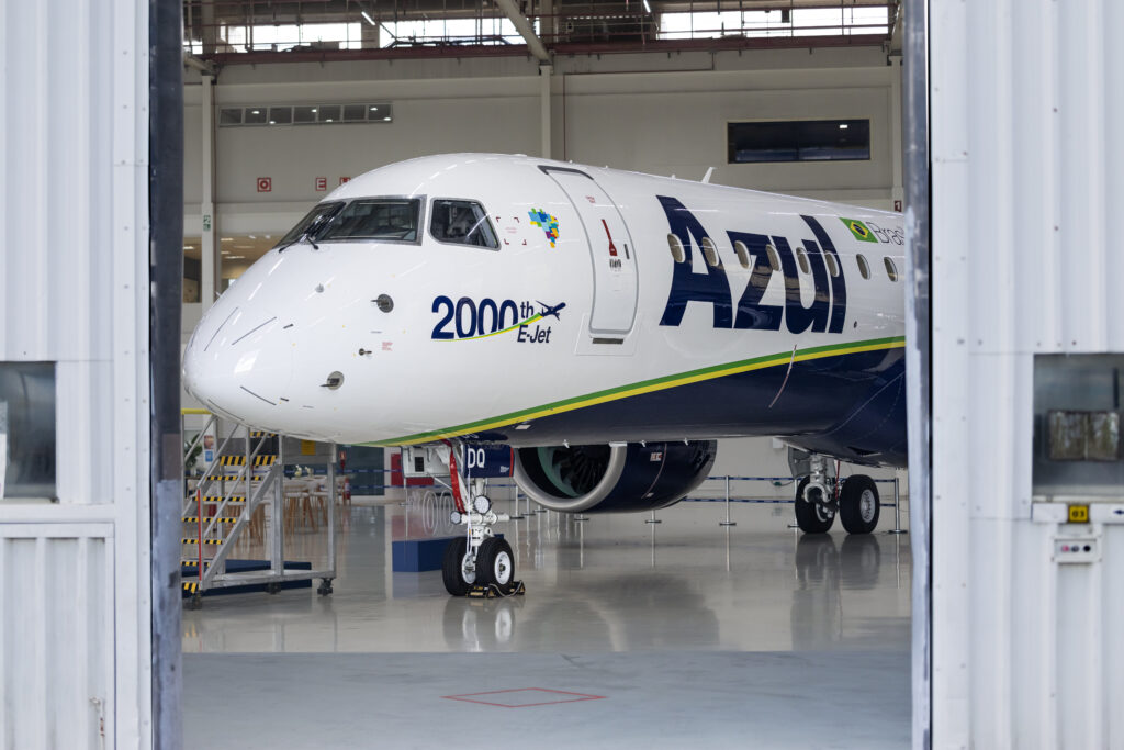 An Azul Embraer E195-E2 in the hangar  