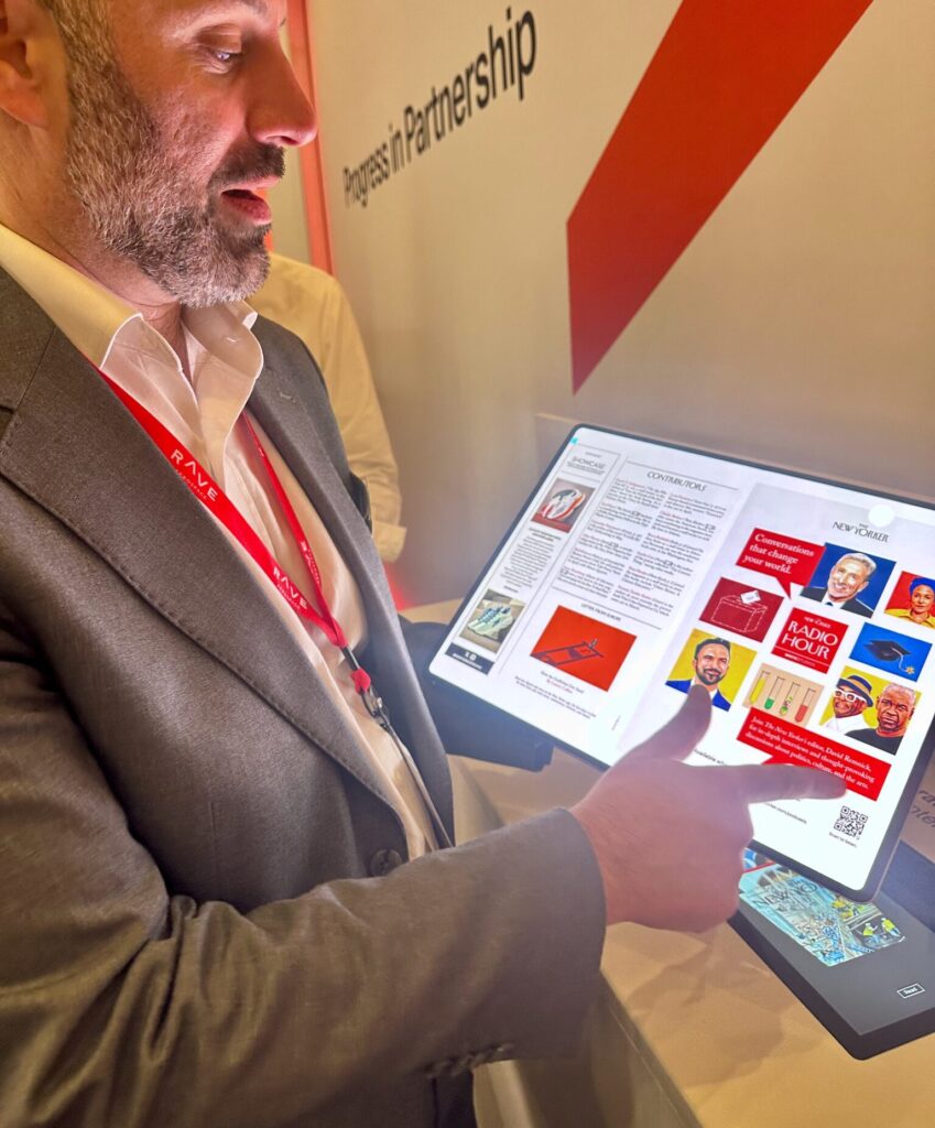 RAVE Aerospace's Ben Asmar demonstrates how the text and images on an e-magazine can be more easily read using the new solution which would be embedded into the side console 