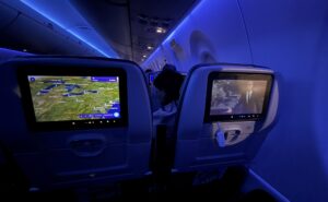Seatback IFE and blue mood lighting on a JetBlue A220